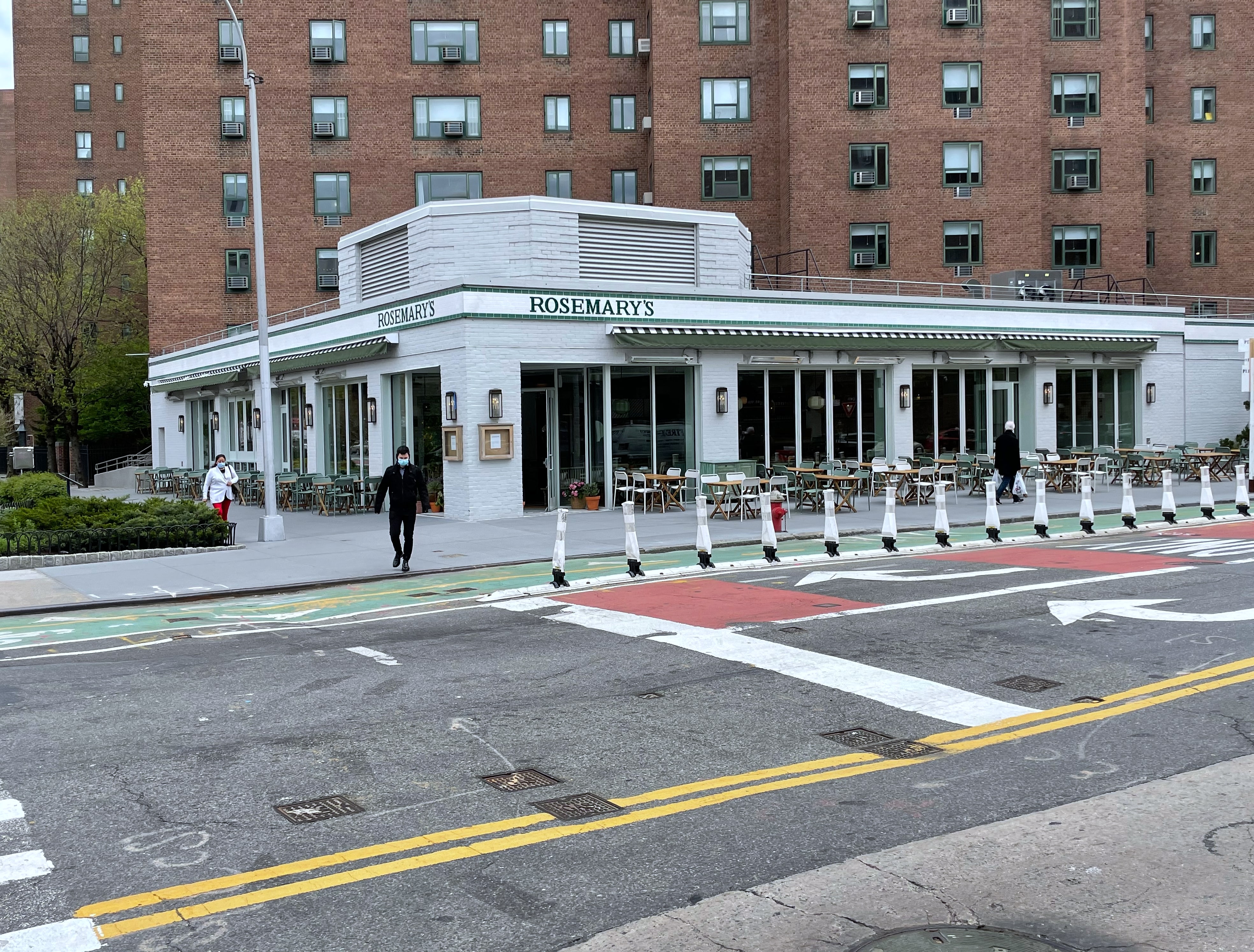 Rosemary's restaurant corner exterior with outdoor seating, street in foreground
